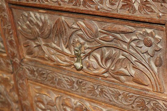 An Anglo Indian foliate carved camphorwood bureau, c.1900, W.92cm